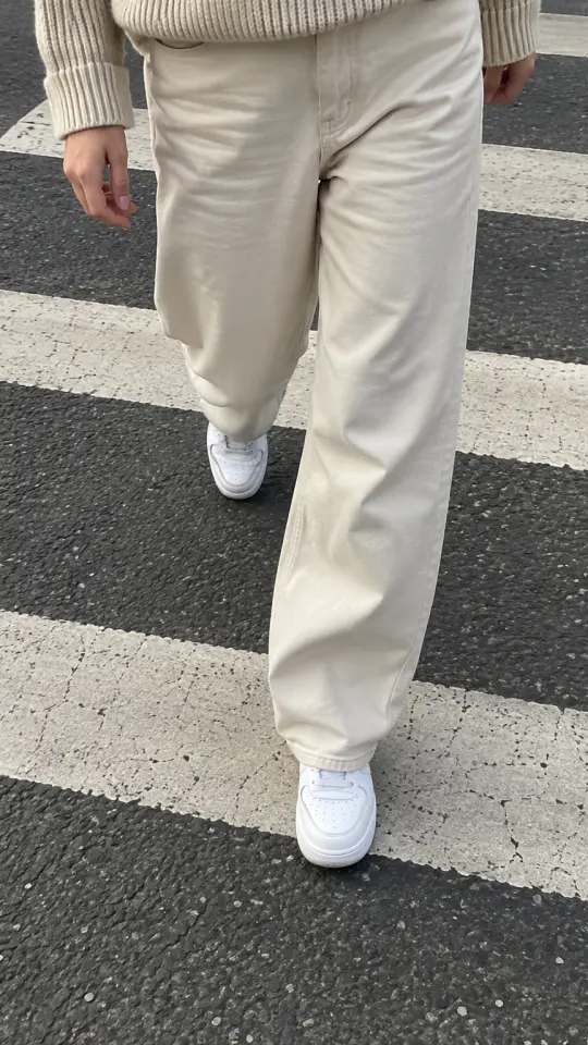 Illustration: white sneakers walking across a crosswalk